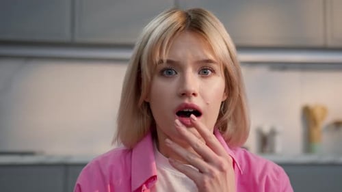 Scared Caucasian Female Student Girl Shocked at Home Apartment Looking at Camera Big Eyes Open Mouth