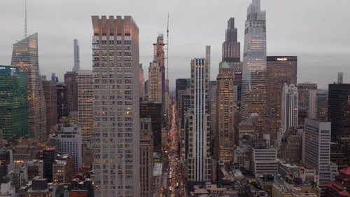 Twilight Descends Upon Midtown Manhattan New York City Casting a Warm Glow on the Iconic Skyscrapers