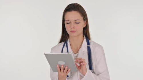 Portrait of Female Doctor Using Digital Tablet on White Background