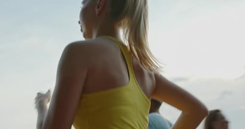 Woman and a Man Run Along the Waterfront Perform Confident Cardio Confidently and Motivatedly Move