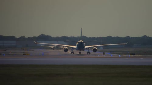 Jet Airplane on the Runway in the Evening Time