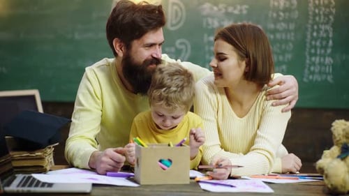 Schoolboy and Parents Studying Family School and Kids Home Schooling Education Family and Homework