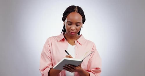 Idea, thinking and black woman writing in book at studio isolated on white background mockup space