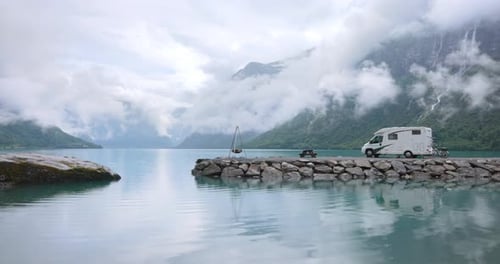 Family vacation travel RV, holiday trip in motorhome. Beautiful Nature Norway natural landscape.