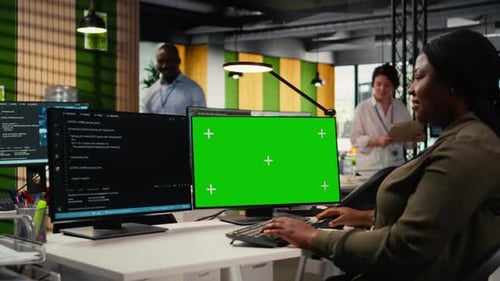 Green Screen Computer Used By Admin in Office Doing Software Development