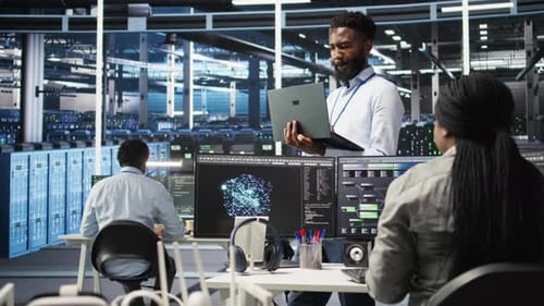 Happy Data Center Admin Using Node Tree Tool Doing High Five with Coworker