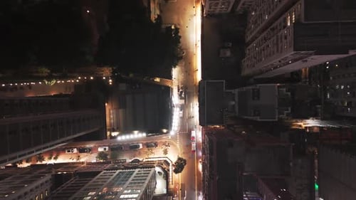 Aerial Top Down View Of City Streets And Buildings Night