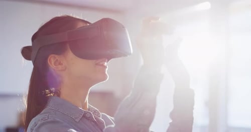 Woman Experiences Virtual Reality with VR Headset Indoors