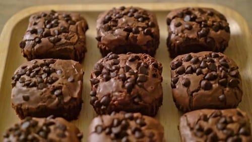 Delicious Chocolate Brownies on a Wooden Tray
