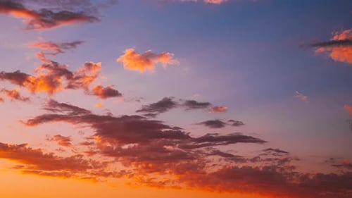 Vibrant Colors Sunrise Sky With Fluffy Clouds