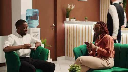 Newlywed Couple Waiting in Hotel Lobby