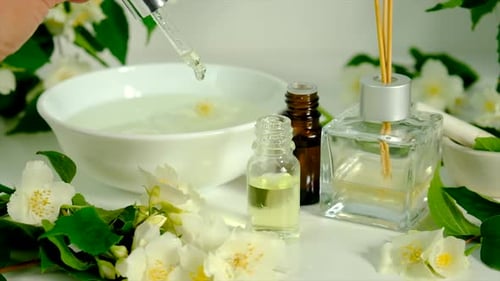 Dropping Jasmine Oil for Aromatherapy Treatment