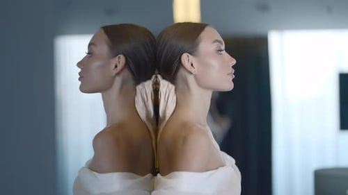 Glamorous Woman Profile Posing in front of Mirror
