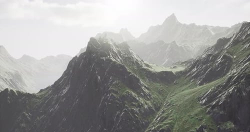 Mountain Landscape with Lush Greenery and Dramatic Peaks Under Bright Sky