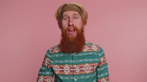 Man Pointing to Camera and Looking with Playful Happy Expression Making Choice of Lucky Winner