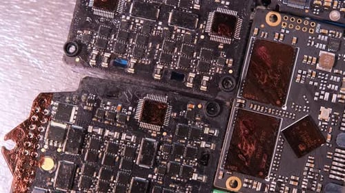 Microchip and microprocessors, top view, rotate background. Computer PC chip close up.