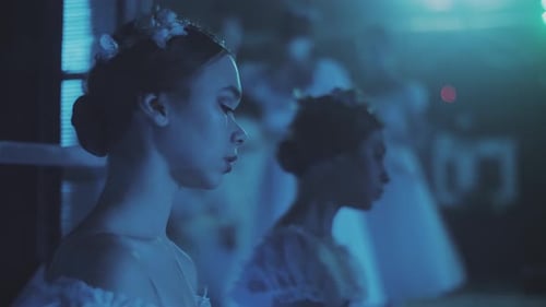 Dreamy Ballerinas in Dimly Lit Room