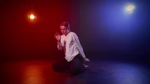 Expressive Young Adult Dancer Performing on Stage