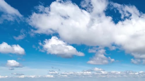 Clouds Drifting Across Blue Sky Time lapse