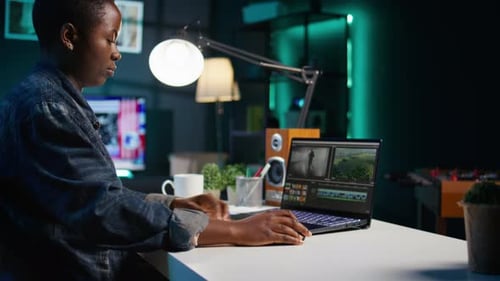 Freelancer Using Editing Tools on Computer to Cut Movie Project Footage