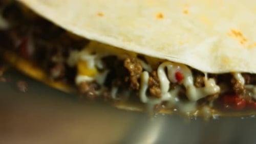 Delicious Quesadilla with Meat and Melted Cheese