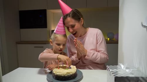 Mother and Daughter Celebrating Birthday at Home