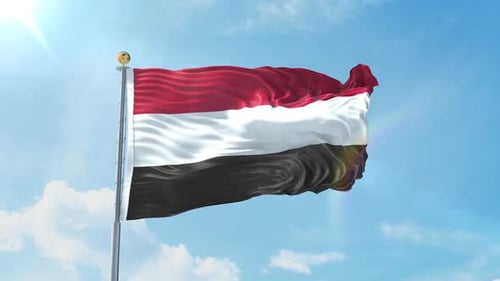 Realistic Flag of Yemen Waving in Clear Blue Sky