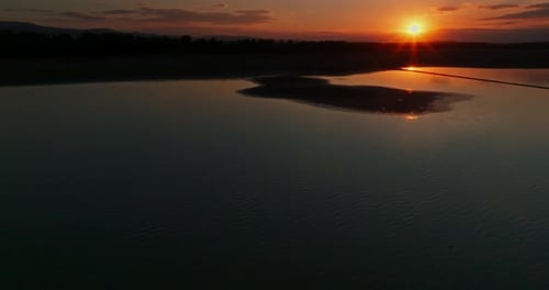 Beautiful View of the Island on the Lake During Sunset