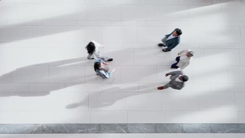 Above, business people and shaking hands in meeting, office and professional greeting of employees
