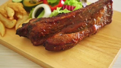 grill barbecue pork spare ribs with vegetables