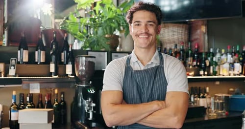 Barista, face and man with arms crossed in restaurant for customer service
