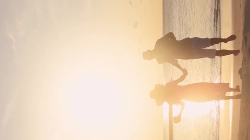 Romantic Couple Together Run On The Beach (Vertical)