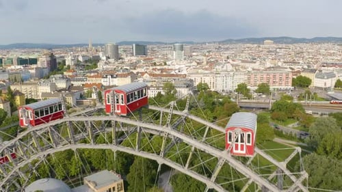 Drone Rises To Reveal Vienna, Austria behind Viennese Giant Ferris Wheel. Aerial View of Viennese Gi