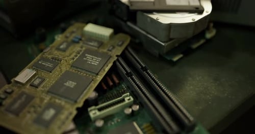 Exploring Old Computer Components with Circuit Boards and Hard Drives