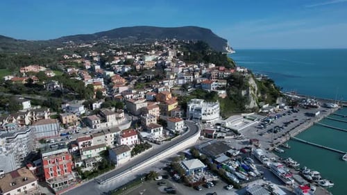 Numana village, Conero Riviera in Le Marche, I Italy, drone aerial footage. Reveal and taking off.