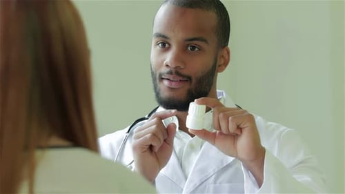 Doctor Explains Medication Use to Patient