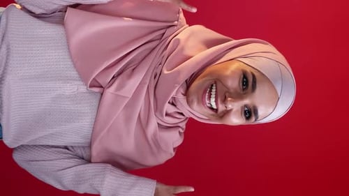 Happy Woman Cheering in Vertical Format Video