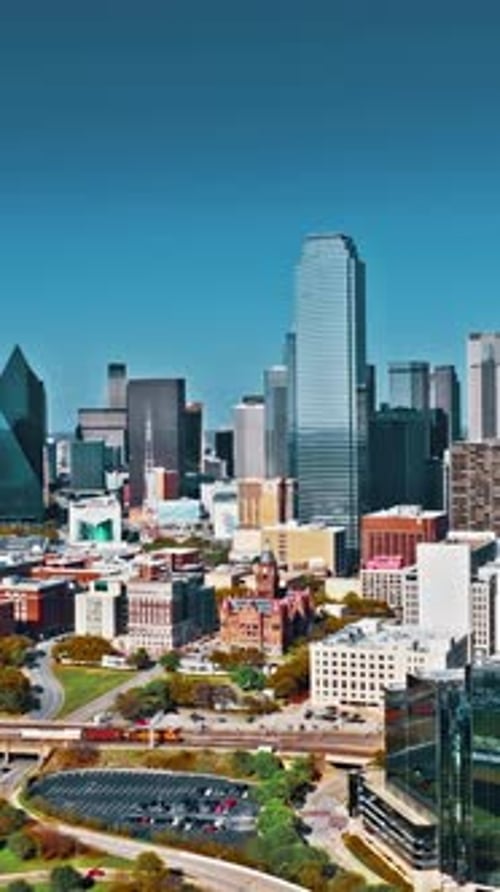Aerial view of Dallas skyline showcasing urban architecture and greenery