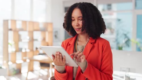 Creative, woman and typing with tablet in office for reading email, online news