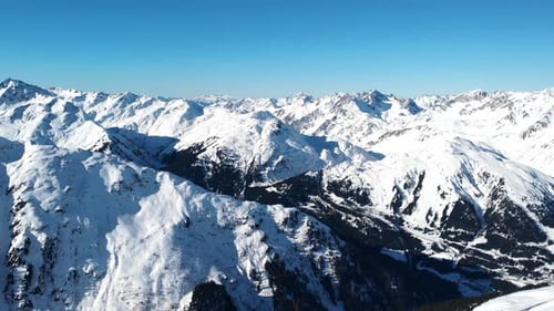 Clear Sky Over Snowy Mountains Sunlit Mountain Summits With Icy Ridges And Expansive Horizons Media