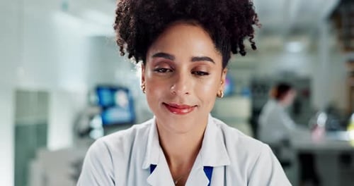 Smiling Scientist in Modern Bright Laboratory Close Up