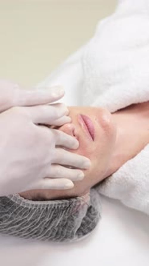 Facial Treatment Process at a Skincare Clinic Demonstrating Techniques in a Serene Environment