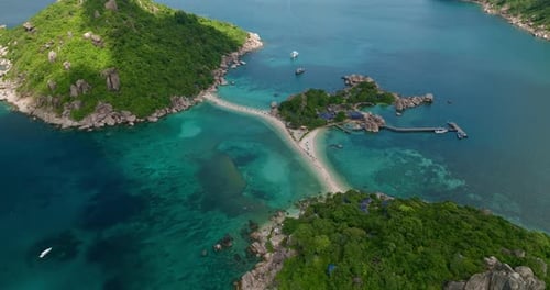 Tilt up reveal shot of Koh Nang Yuan Island, Koh Tao in Thailand