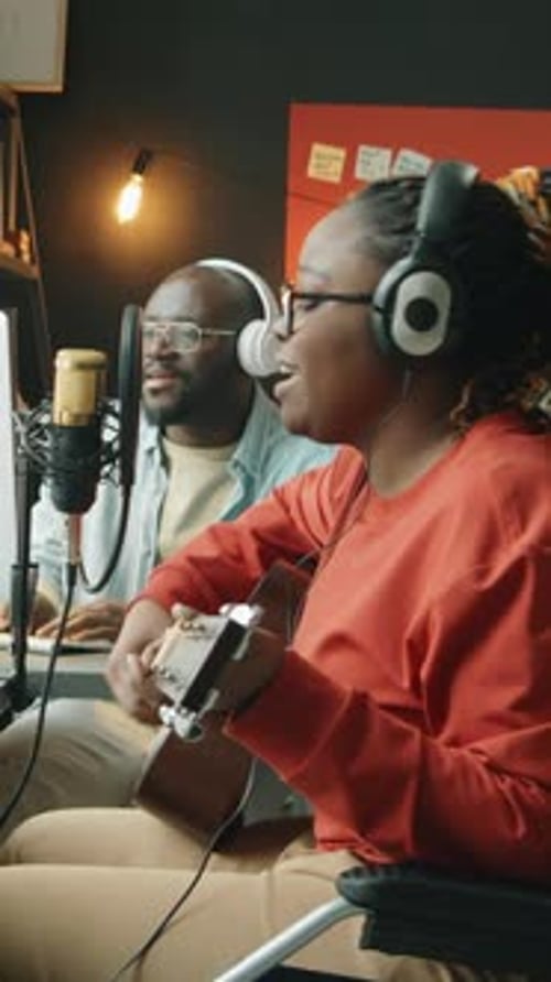 Black Woman Performing Guitar Play, Collaborating with Producer in Home Studio