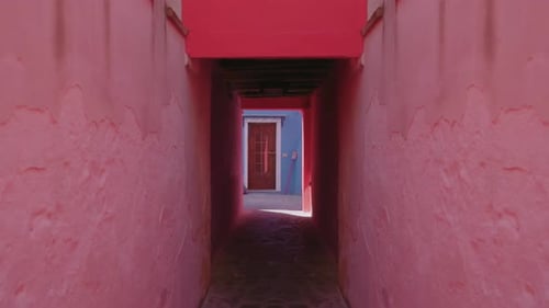 Narrow Street Between Pink Walls