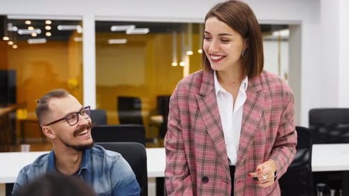 Businesswoman Negotiate and Reach Successful Agreement By Shaking Hands in Office Partners Signing