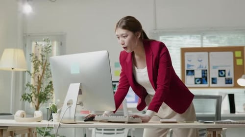 African Businesswoman in suit is working on laptop office space