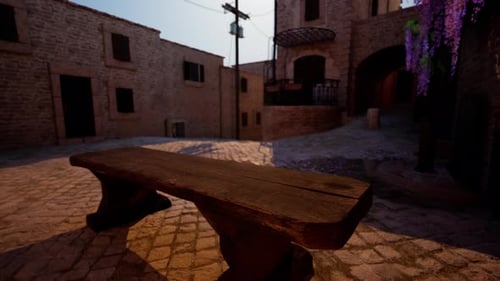 Wooden Bench on Cobblestone Street