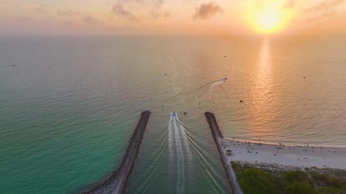Venice South Jetty and Nokomis North Jetty with Recreational Motorboats and Yachts Sailing at Inlet