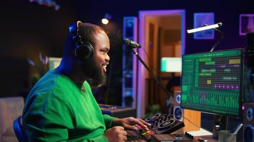 Man Creating Music in His Home Recording Studio